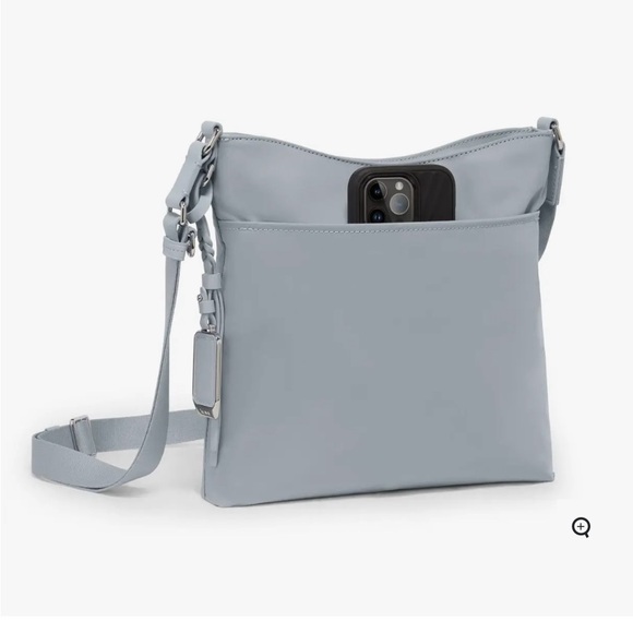 Tumi Blue Crossbody Bag with Adjustable Strap and Minimalist Design - Picture 3 of 8